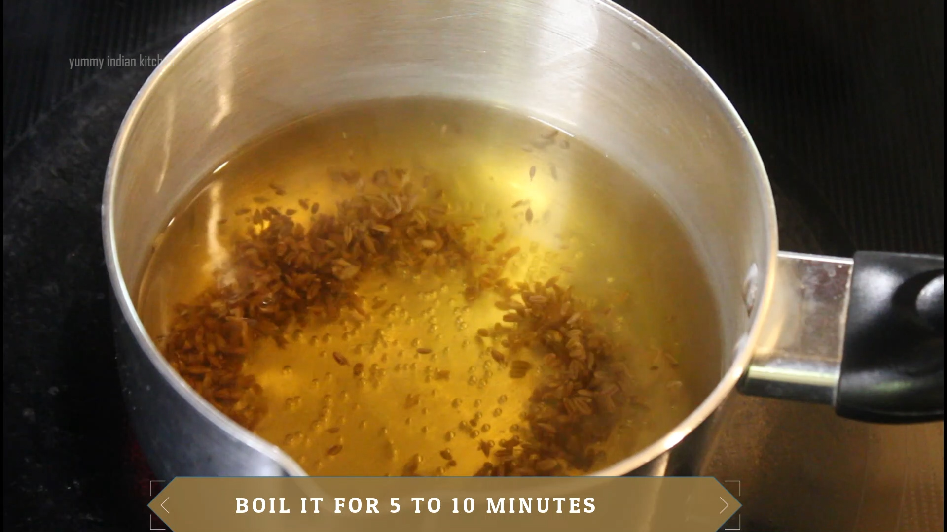 boiling the jeera seeds