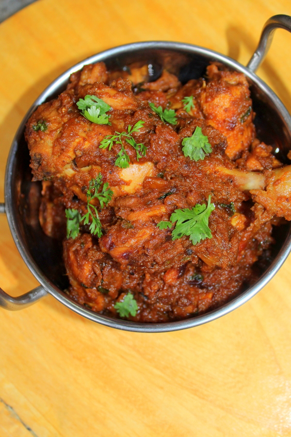 Chicken masala served in a wok