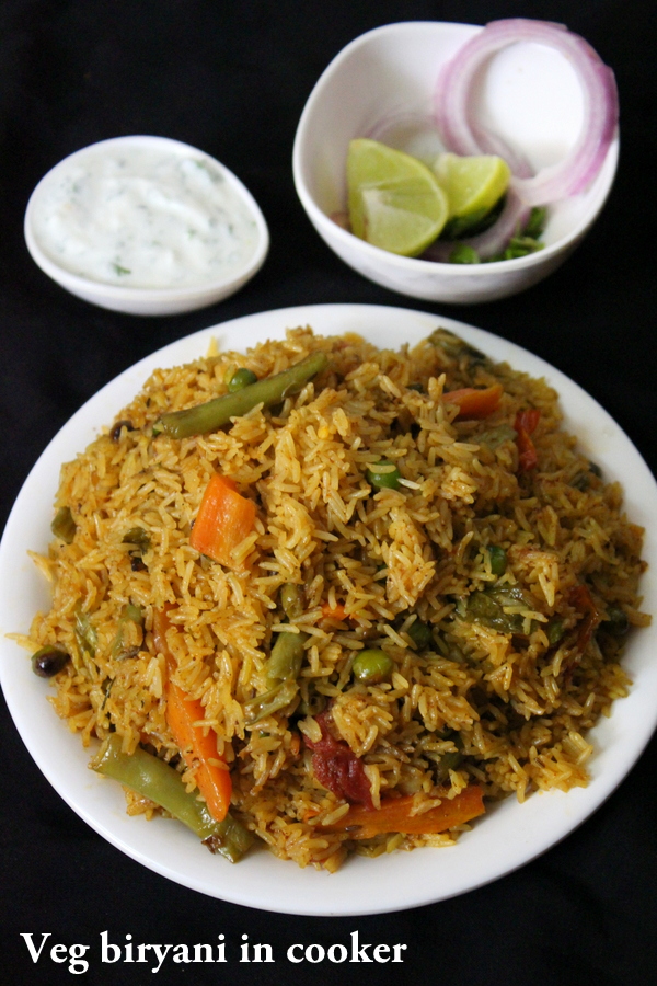 vegetable biryani in pressure cooker serve in a plate