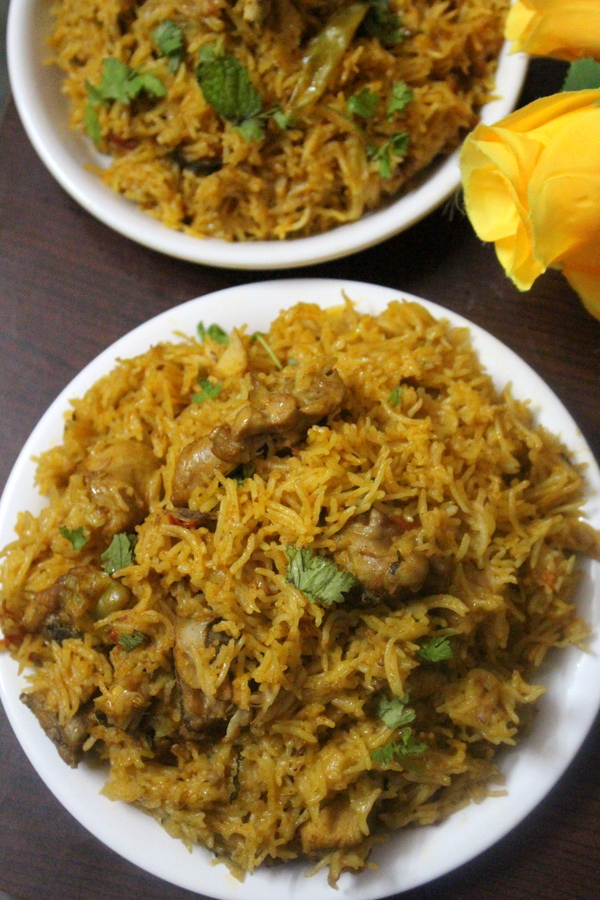 pressure cooker biryani or pressure cooker chicken biryani served on a plate