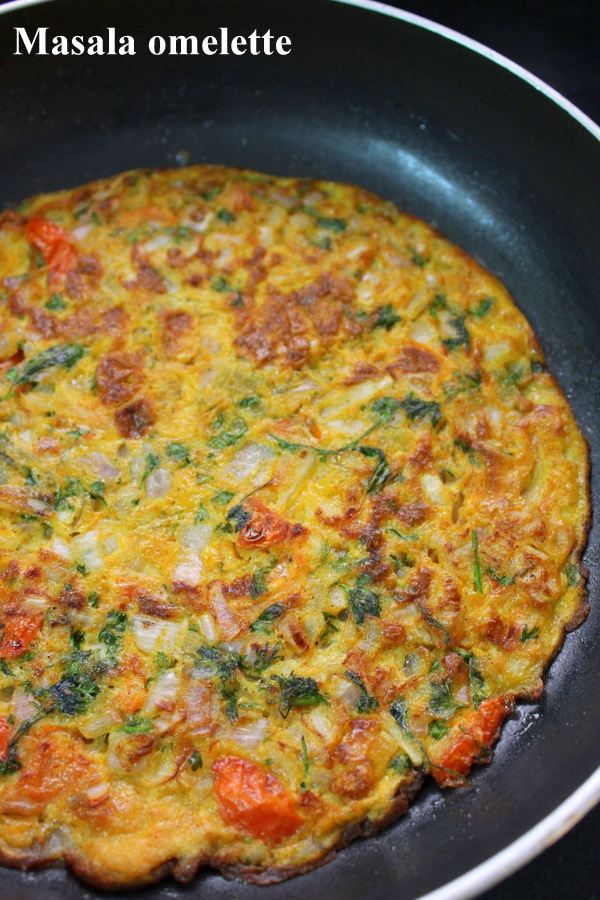 masala omelette indian breakfast recipe in a pan