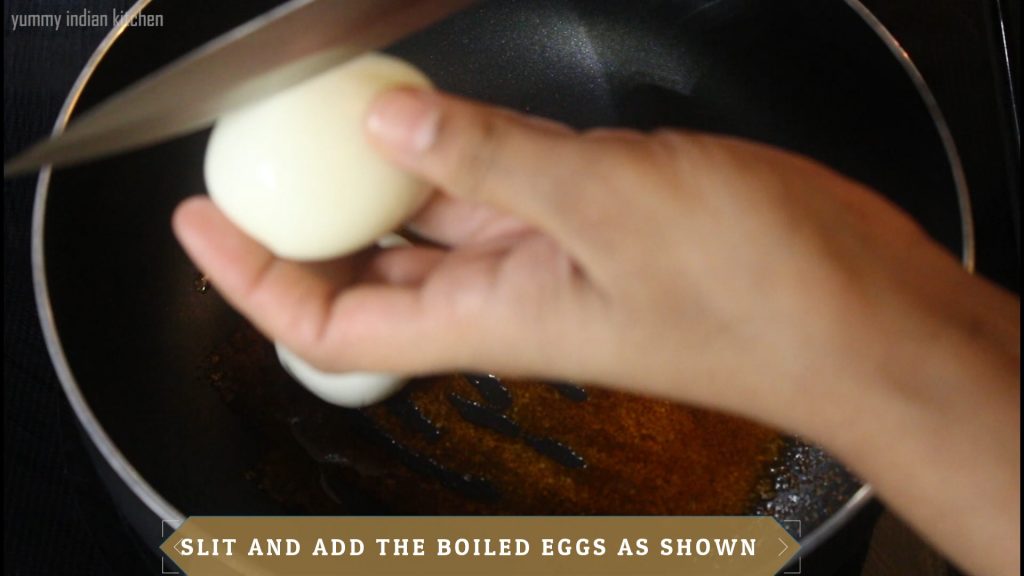 Slitting the peeled boiled eggs