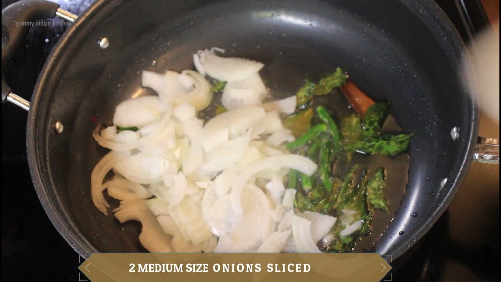 Add the slit green chilies, sliced onions