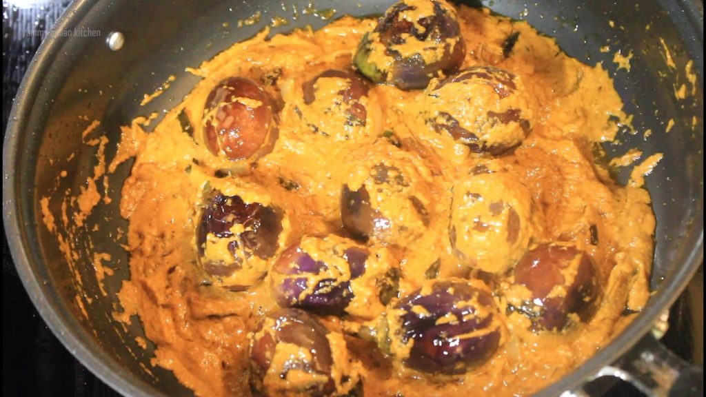 Add the remaining blended masala paste in gutti vankaya kura