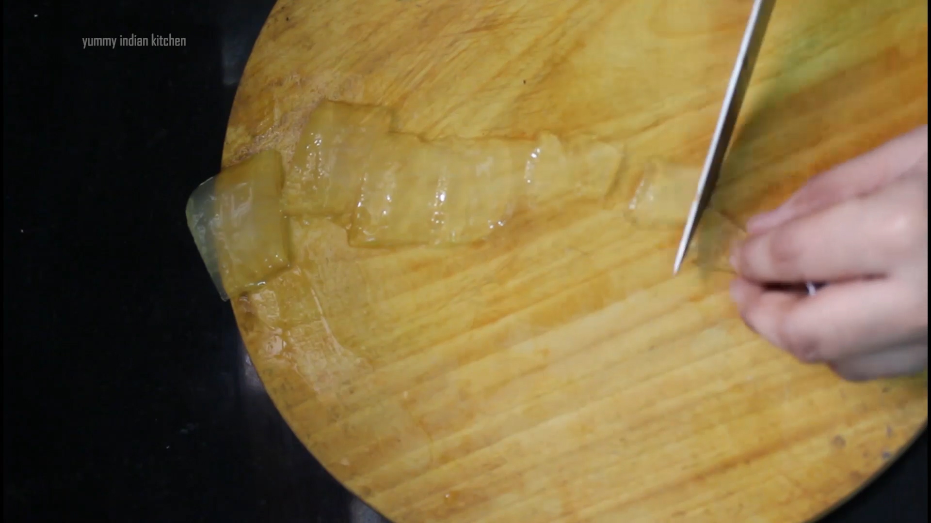 cutting the homemade aloe vera gel into cubes