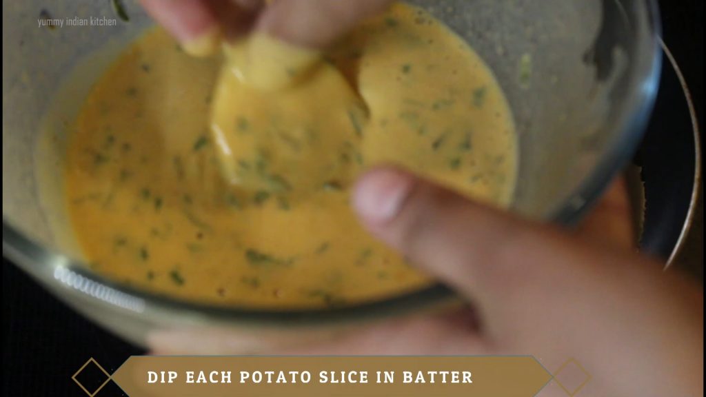 Take the dipped potato slice 