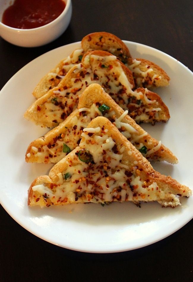 chilli cheese toast cut into diagonal shape and served