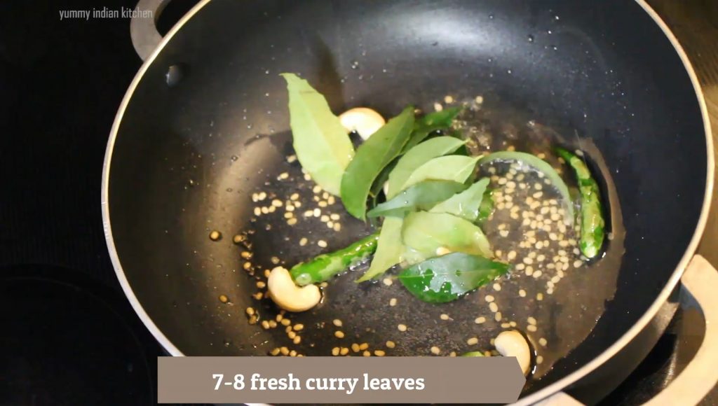 Adding fresh curry leaves