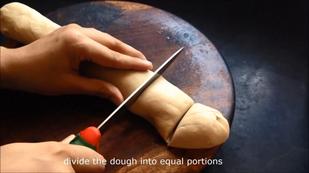 Dividing the dough into small equal sized portions