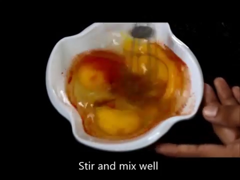 beating the egg mixture in the bowl