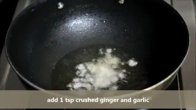 adding crushed ginger garlic