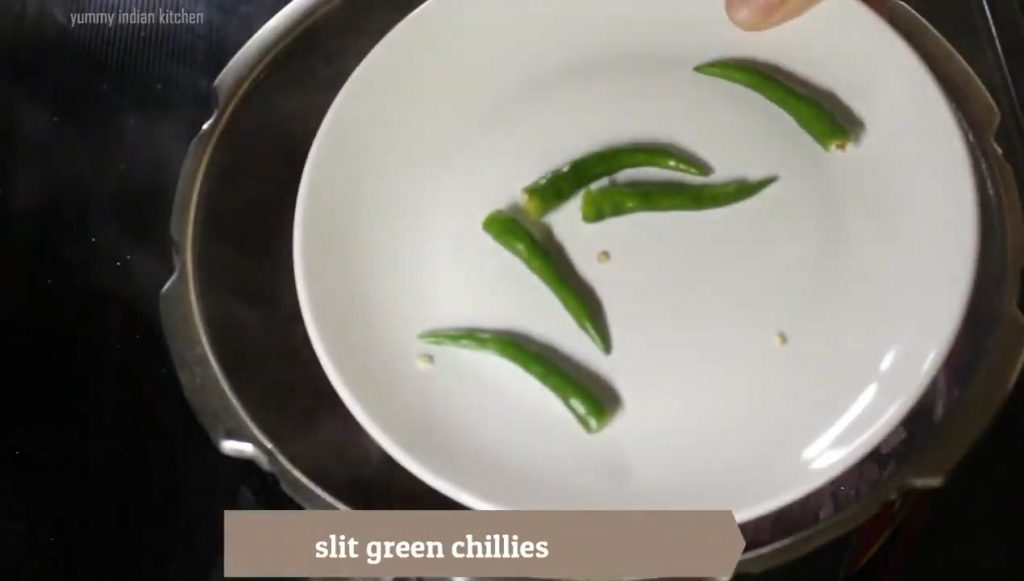 Adding green chillies .