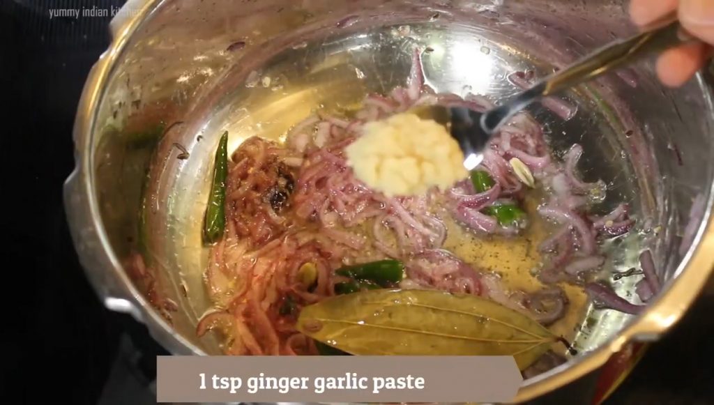 adding ginger garlic paste to saute