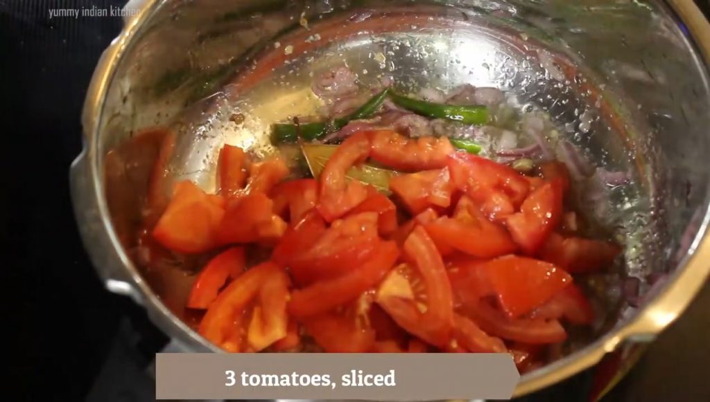 Adding the chopped tomatoes
