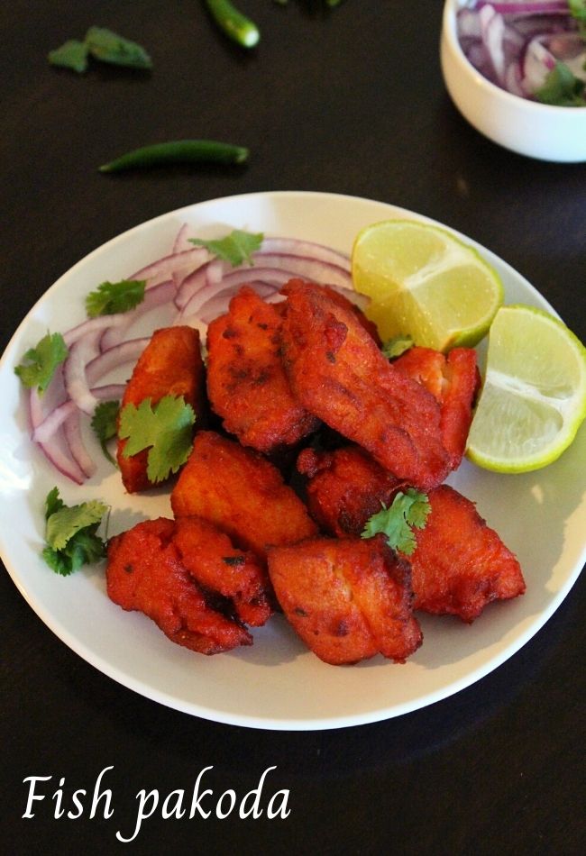 fish pakora served in a plate with garnishing