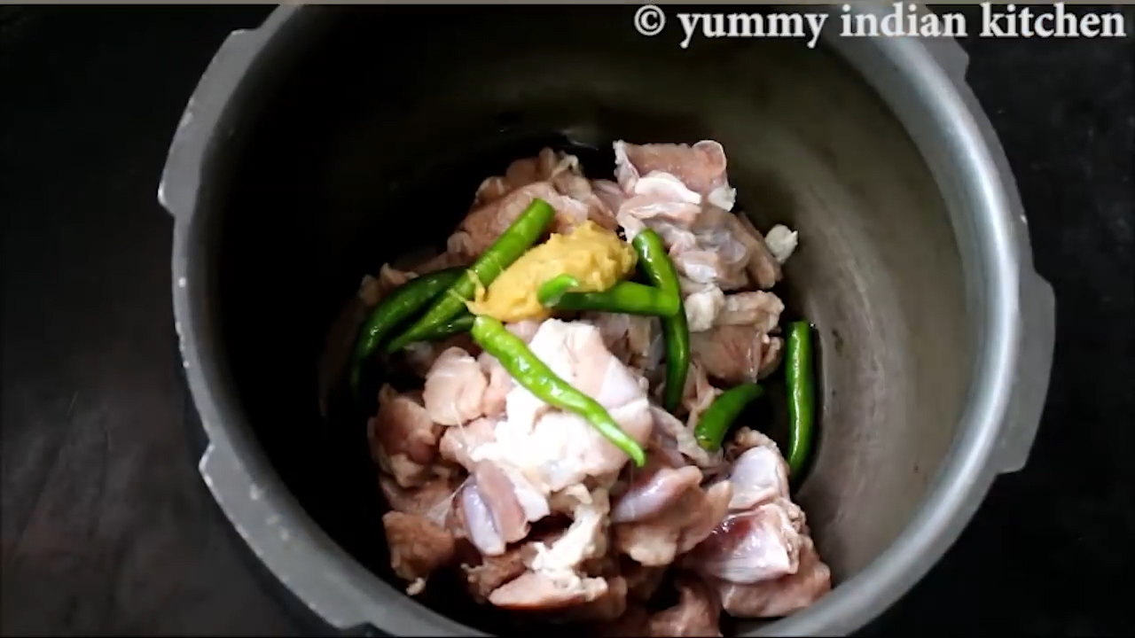 mutton chunks,  8 green chillies, ginger garlic paste in a pressure cooker,