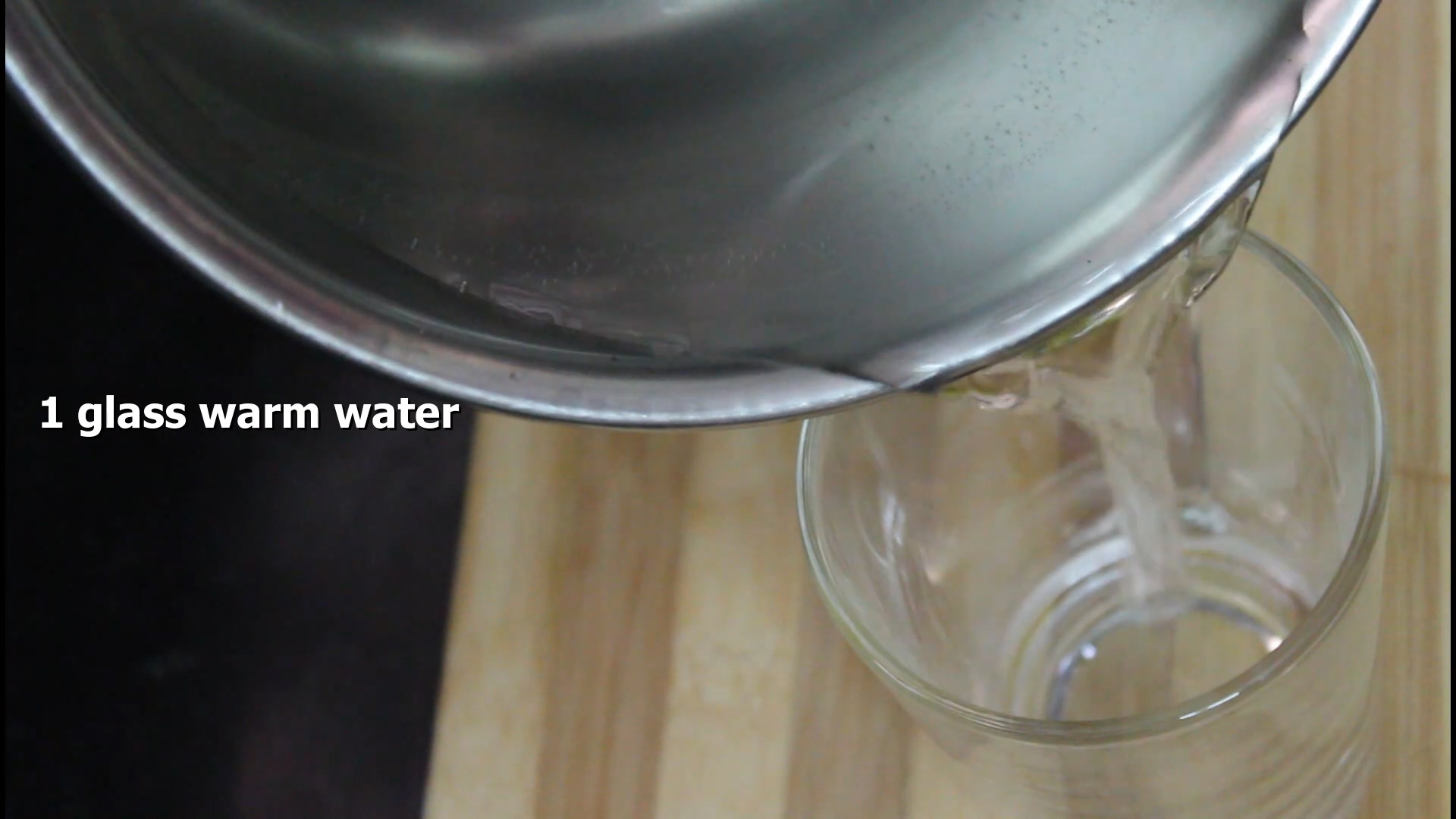 adding water in the glass