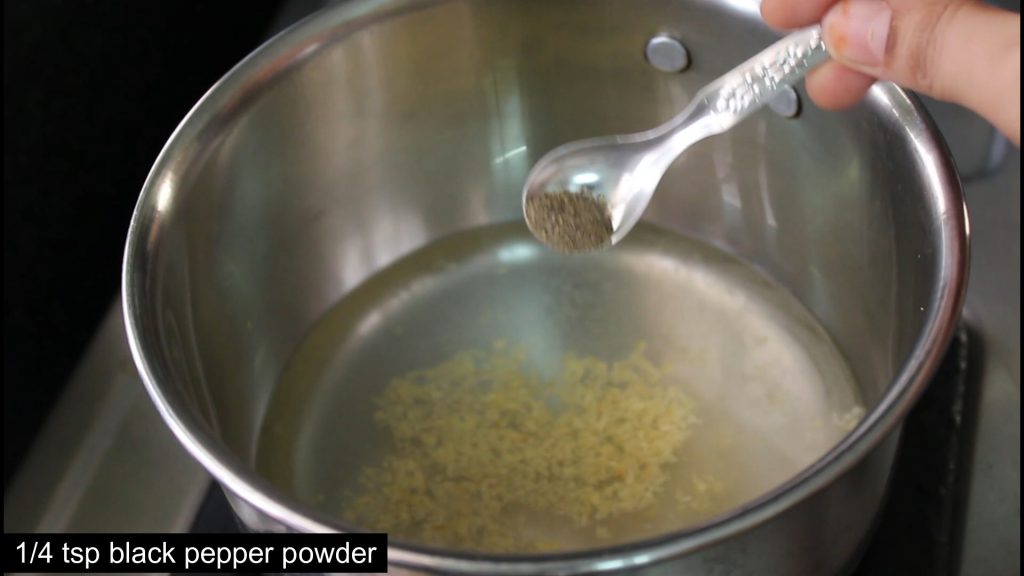 showing black peppercorn powder to add into the water