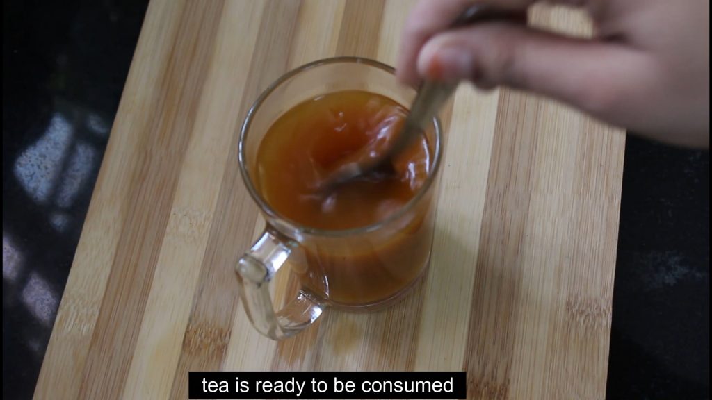 stirring turmeric tea for weight loss