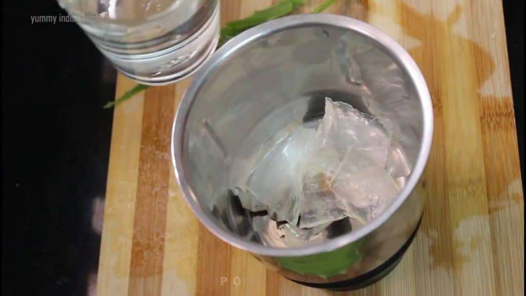 adding the gel cubes of aloe vera to a jar