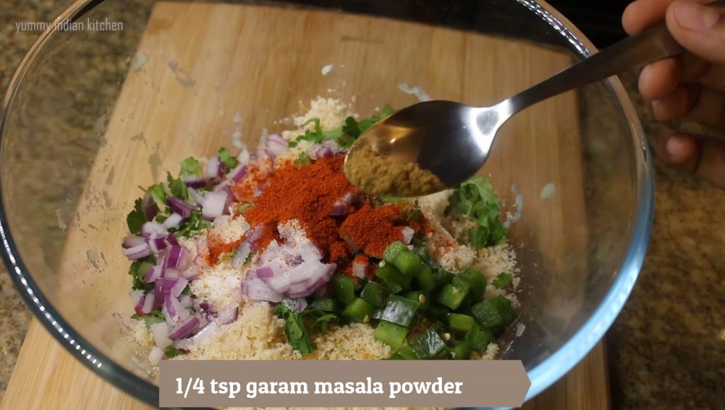 adding red chili powder, turmeric powder, add cumin powder, garam masala powder