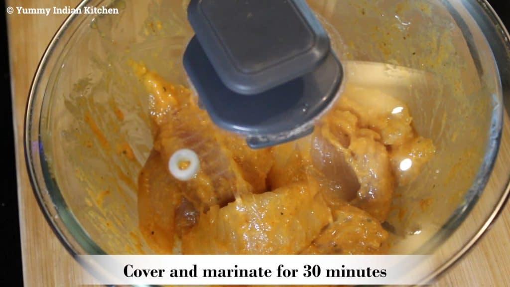 Covering and marinating in refrigerator for at least 30 minutes