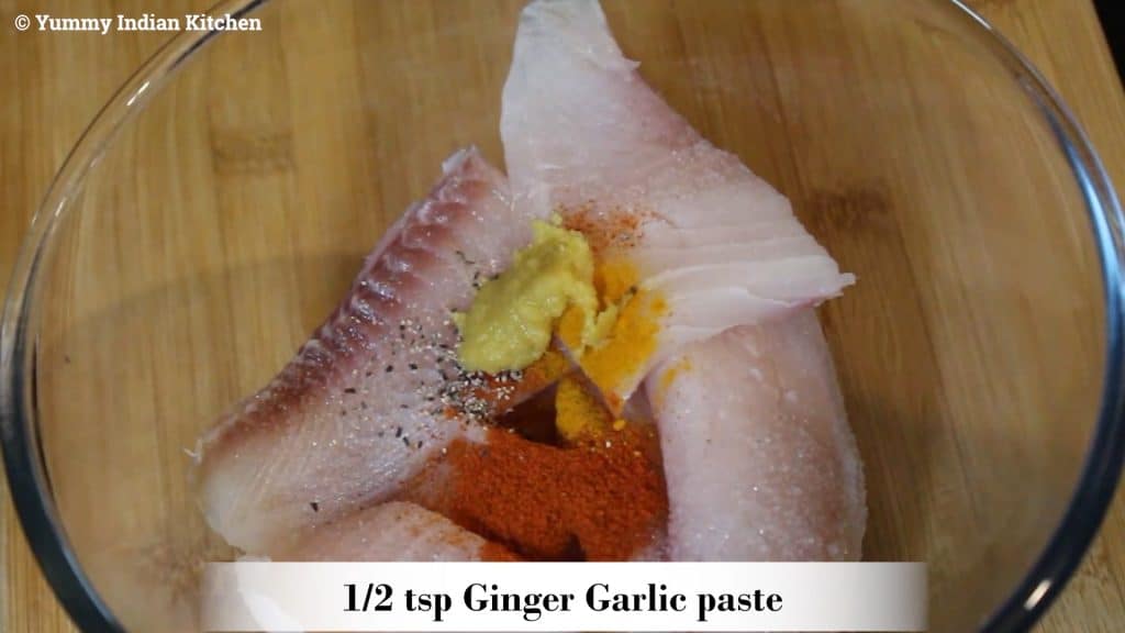 Adding salt as per taste, red chili powder, turmeric powder, black pepper powder, add ginger garlic paste