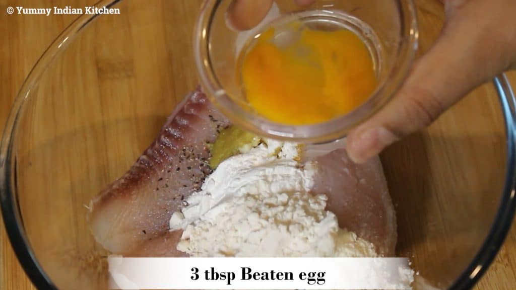 Adding beaten egg to the marination. add lemon etxract.