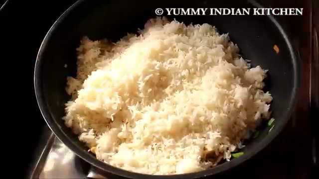 adding cooked rice