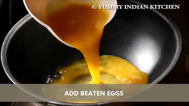 adding the beaten eggs