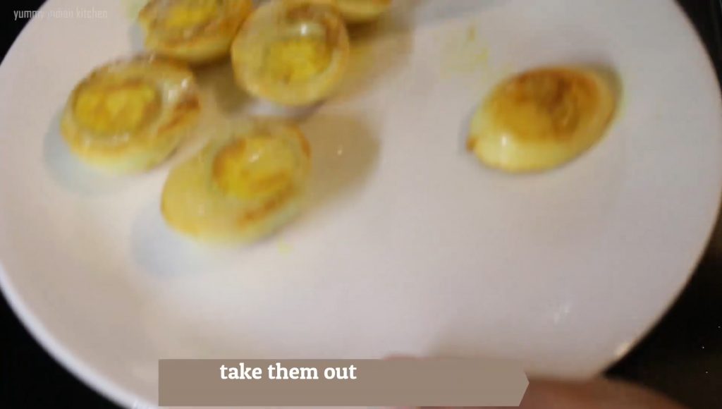 taking the eggs out on a plate