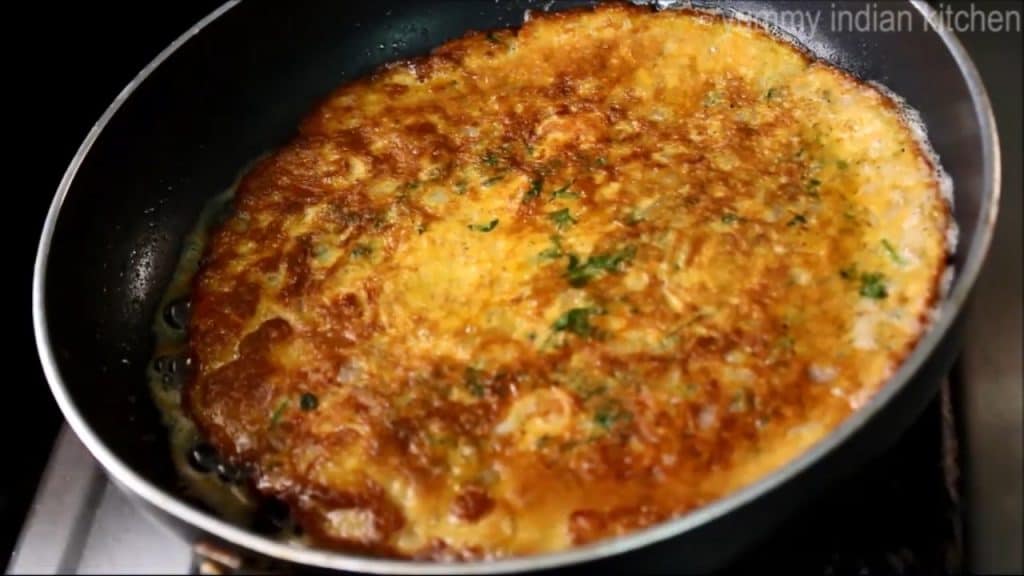 cook both the sides of masala omelette recipe