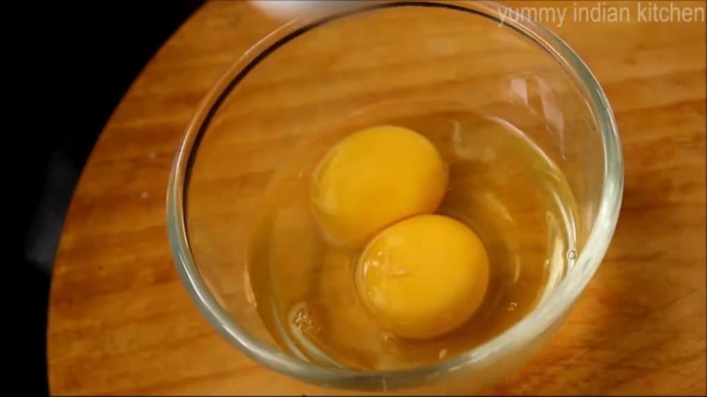 Take a bowl, break 2 eggs into it