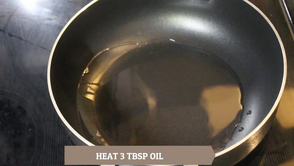 adding oil and heating it