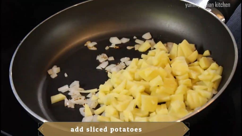 Adding the finely sliced potatoes