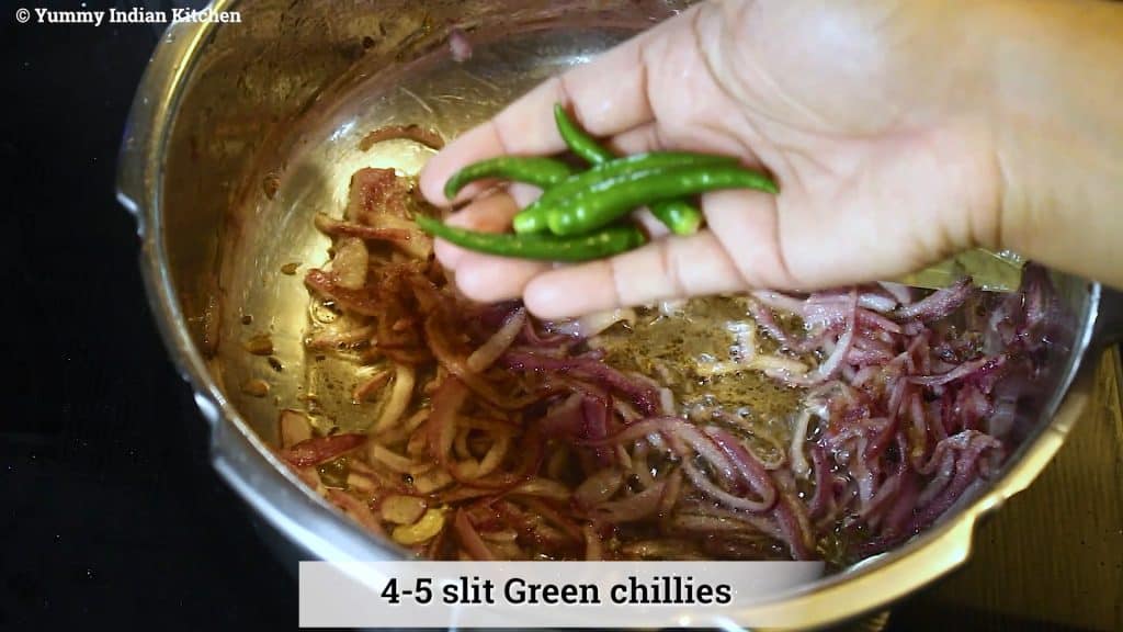 Adding slit green chillies