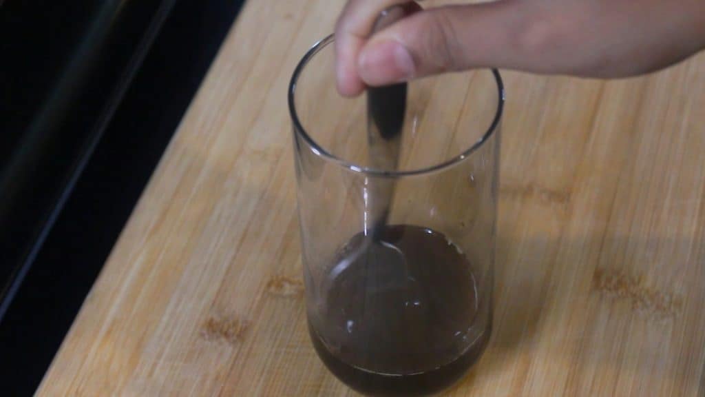 stirring the coffee and the syrup