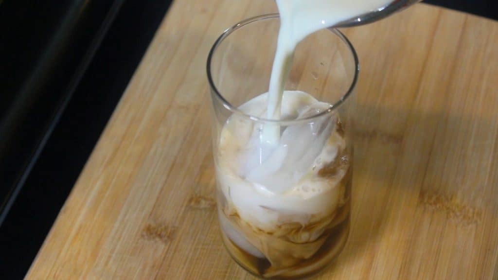 pouring milk into the glass
