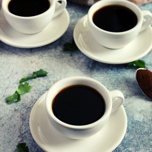 instant black coffee served in three different cups