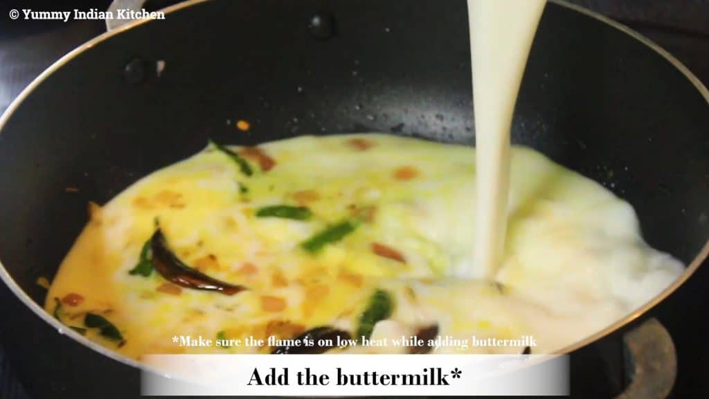 Adding the buttermilk to make moru kachiyathu