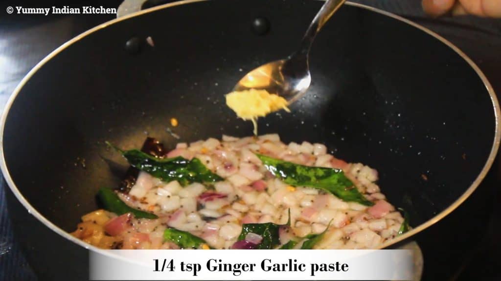 Adding ginger garlic paste