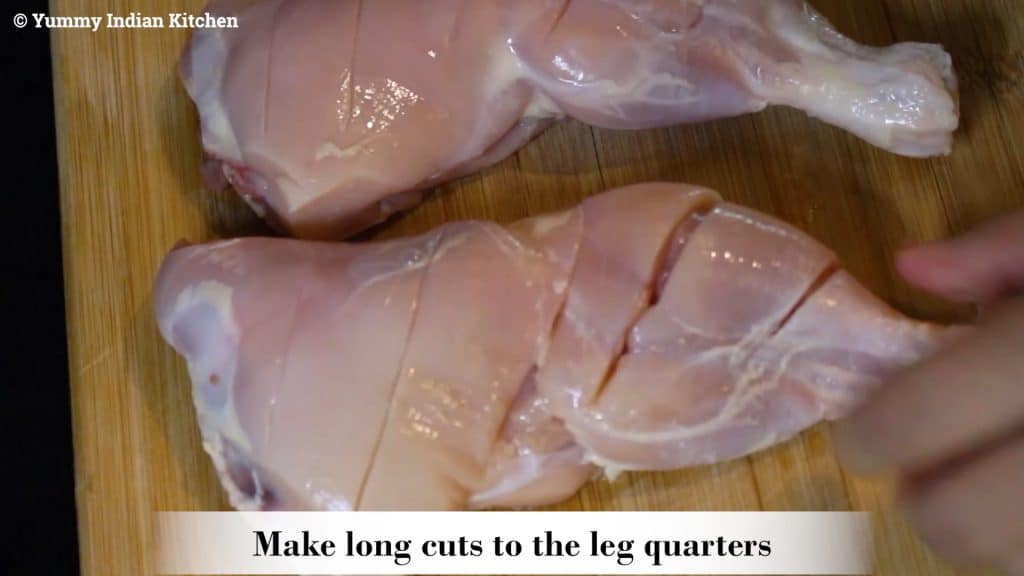 Make cuts to the peri peri chicken with a knife
