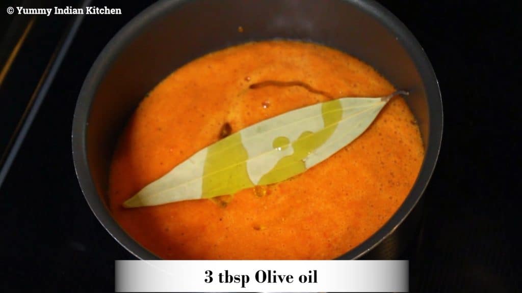 Add bay leaf, olive oil to the paste in pan