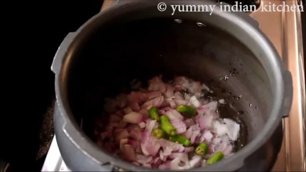 sauteing chopped onions, chopped green chillies, cumin