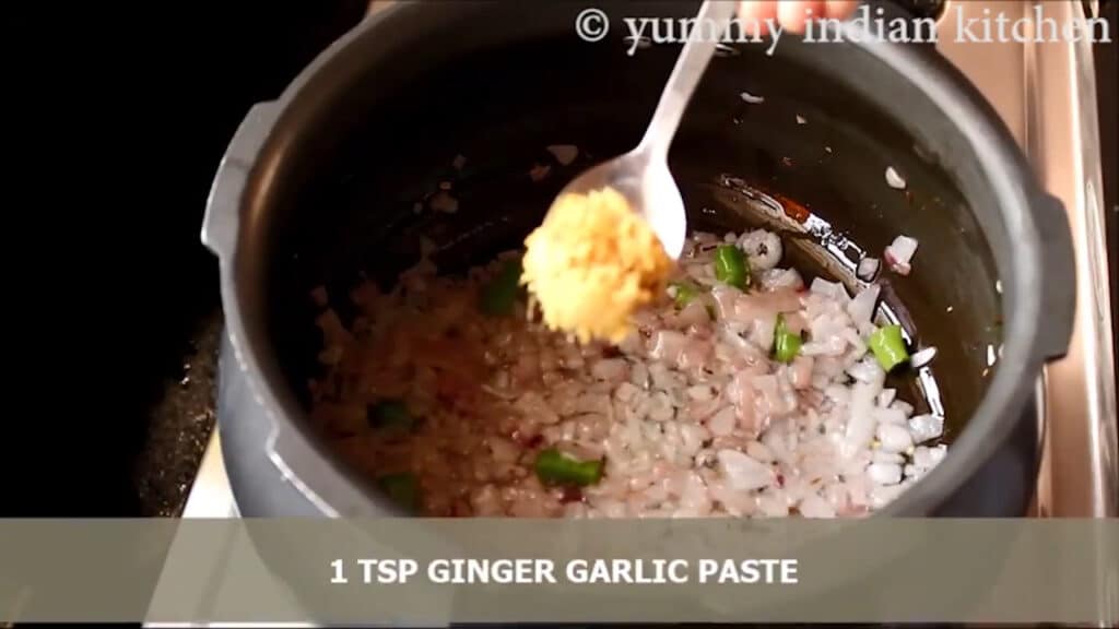 Adding ginger-garlic paste and sauteing