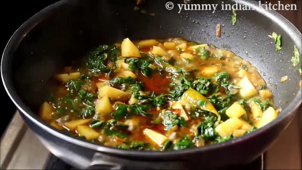 cook aloo palak for few minutes