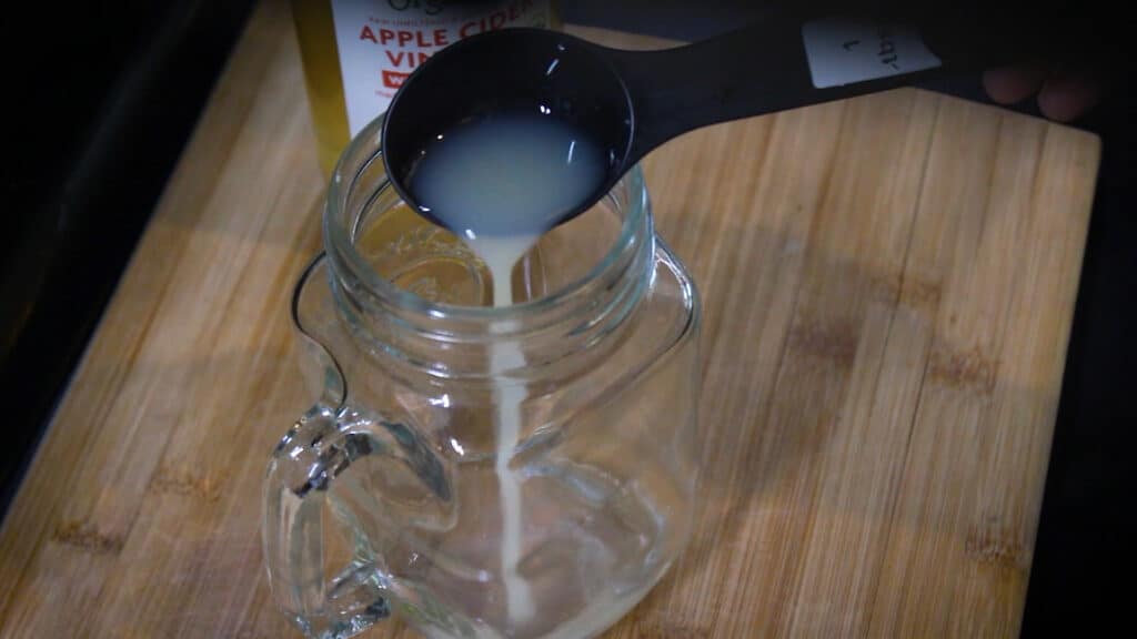 Adding a tablespoon of lemon extract to the drink