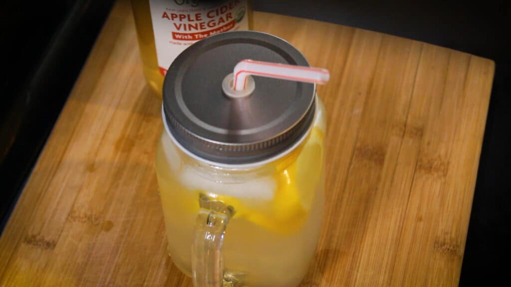 serving apple cider vinegar and lemon juice using a straw