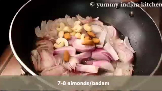 Adding chopped onions, kaju, badam