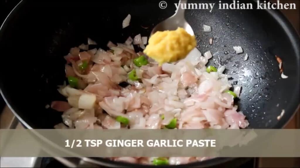 Adding ginger-garlic paste